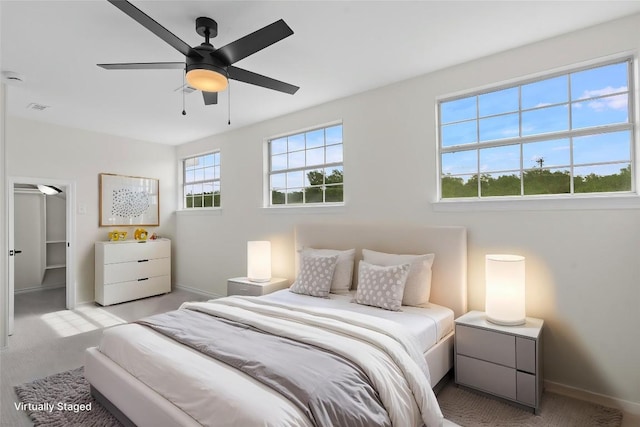 206 High Plains Dr, Dripping Springs, TX 78620 - bedroom featuring light carpet, baseboards, and ceiling fan
