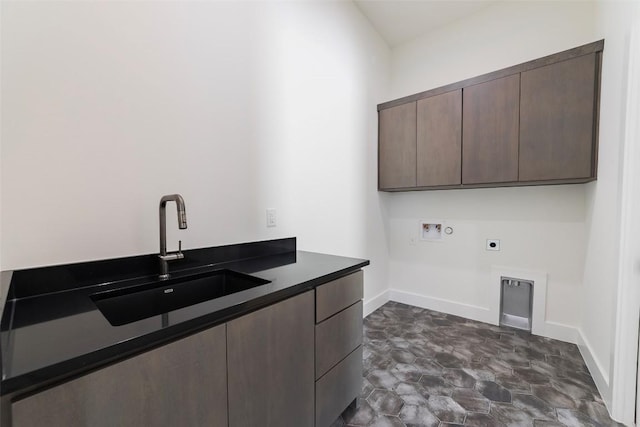 125 Azalea Loop, Horseshoe Bay, TX 78657 - laundry room featuring cabinet space, washer hookup, electric dryer hookup, and baseboards