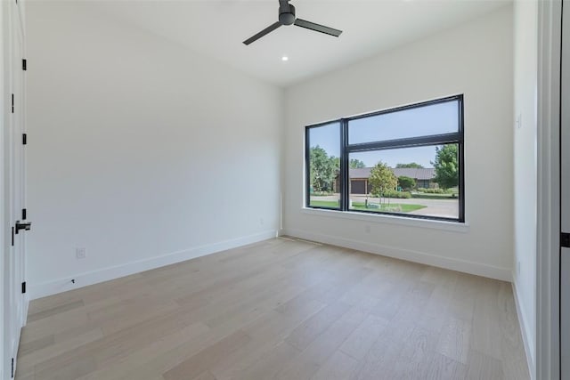 125 Azalea Loop, Horseshoe Bay, TX 78657 - unfurnished room featuring light wood-type flooring, a ceiling fan, baseboards, and recessed lighting