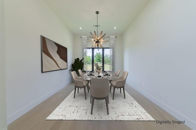 125 Azalea Loop, Horseshoe Bay, TX 78657 - dining space with a chandelier, baseboards, wood finished floors, and recessed lighting