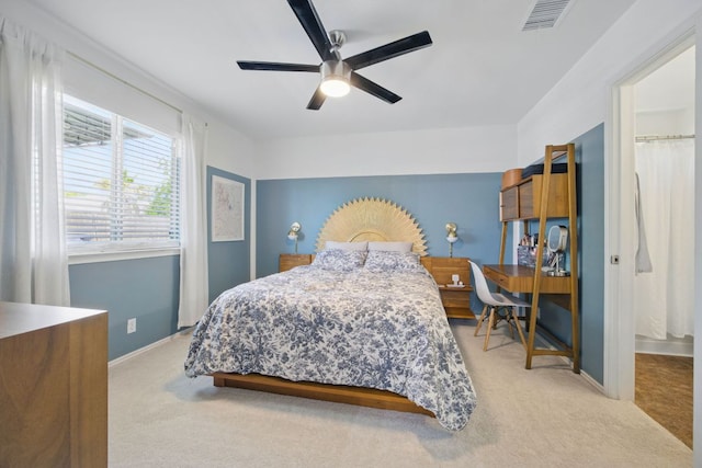 16708 Hamilton Point Cir, Manor, TX 78653 - bedroom with carpet flooring, baseboards, and a ceiling fan