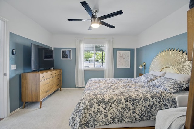 16708 Hamilton Point Cir, Manor, TX 78653 - bedroom with light colored carpet, baseboards, and ceiling fan