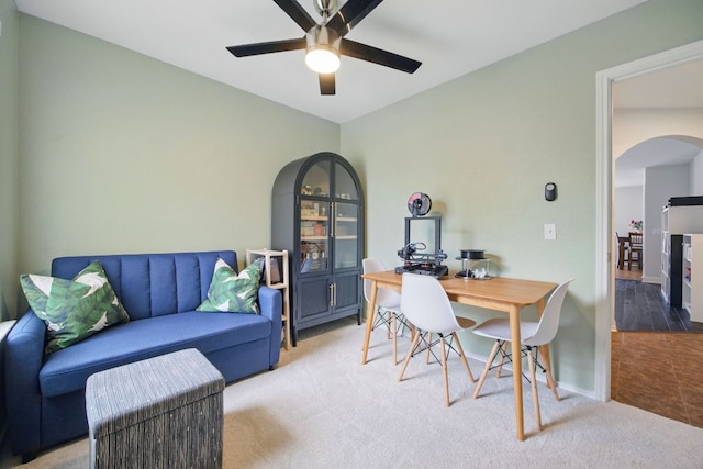 16708 Hamilton Point Cir, Manor, TX 78653 - office area with arched walkways, light carpet, ceiling fan, and baseboards