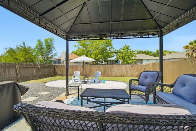 16708 Hamilton Point Cir, Manor, TX 78653 - fenced backyard with a gazebo, an outdoor living space, and a patio