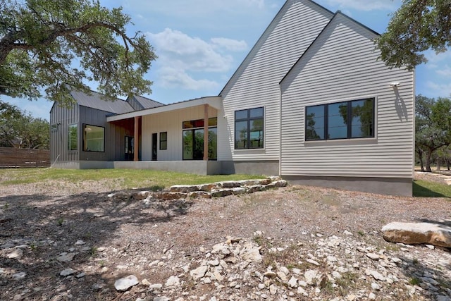 4255 Fm 3405, Georgetown, TX 78633 - rear view of house with board and batten siding