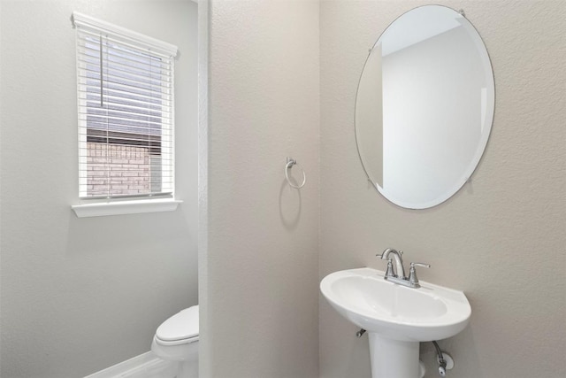 241 Oleander Loop, Buda, TX 78610 - bathroom with toilet and a sink