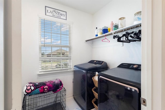 241 Oleander Loop, Buda, TX 78610 - laundry room featuring independent washer and dryer and healthy amount of natural light