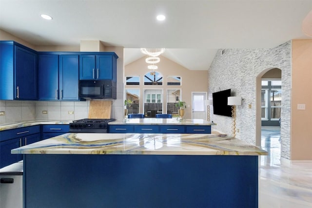 241 Oleander Loop, Buda, TX 78610 - kitchen with blue cabinetry, black appliances, arched walkways, a peninsula, and vaulted ceiling