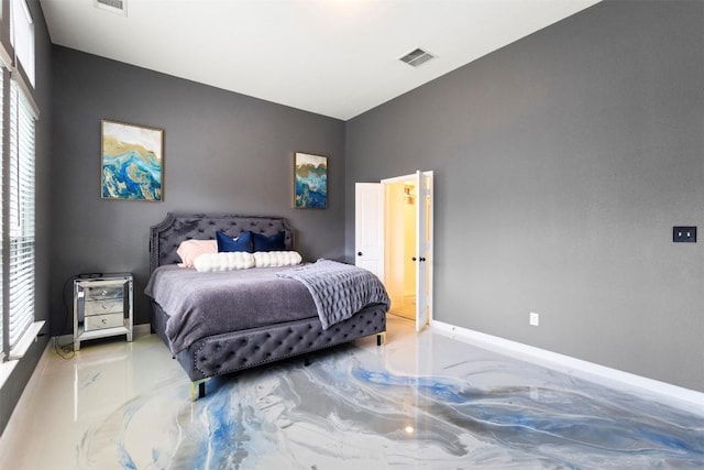 241 Oleander Loop, Buda, TX 78610 - bedroom featuring marble tiled floors, baseboards, and lofted ceiling