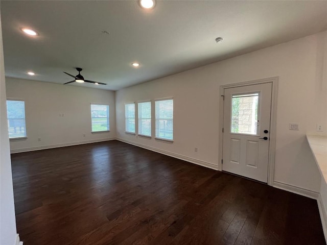 2105 Tiger Trl Unit 101, Round Rock, TX 78665 - entryway featuring dark wood-type flooring, a ceiling fan, healthy amount of natural light, recessed lighting, and baseboards