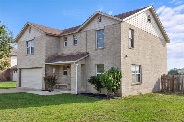 100 N Prairie Ln, Georgetown, TX 78633 - traditional-style home featuring a garage, driveway, brick siding, and roof with shingles