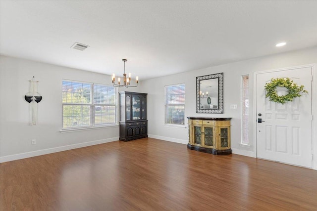100 N Prairie Ln, Georgetown, TX 78633 - entryway with a chandelier, dark wood-style floors, baseboards, and recessed lighting