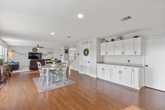 100 N Prairie Ln, Georgetown, TX 78633 - dining area with a ceiling fan, wood finished floors, recessed lighting, and stairway