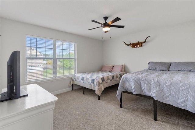 100 N Prairie Ln, Georgetown, TX 78633 - bedroom featuring light carpet, baseboards, and ceiling fan