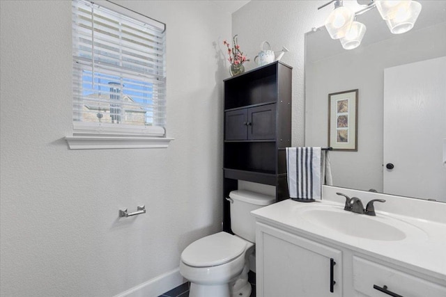 100 N Prairie Ln, Georgetown, TX 78633 - half bathroom with vanity, a textured wall, and a chandelier
