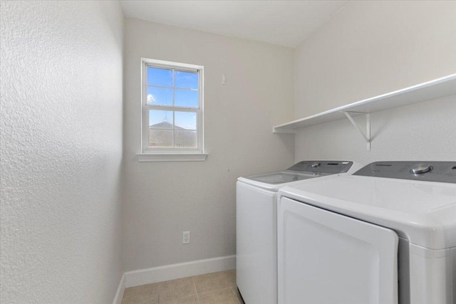 100 N Prairie Ln, Georgetown, TX 78633 - laundry area with washing machine and dryer and light tile patterned flooring