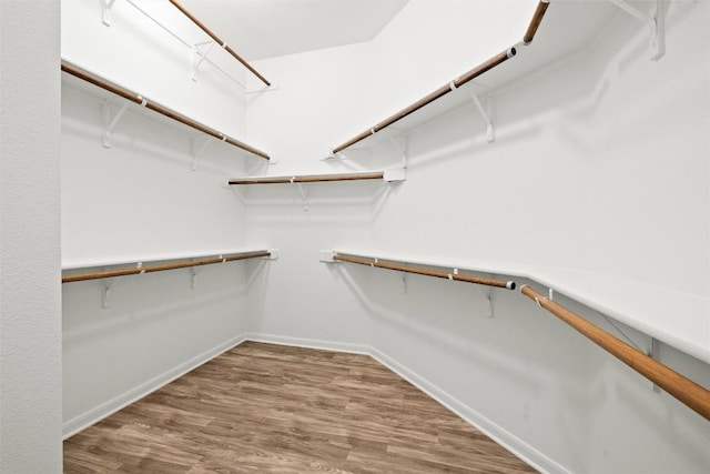 270 Harris Dr, Austin, TX 78737 - walk in closet featuring wood finished floors