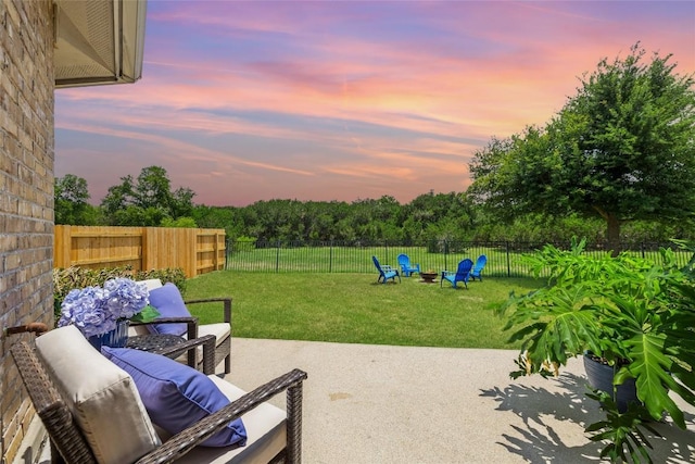 270 Harris Dr, Austin, TX 78737 - patio terrace at dusk featuring a patio and a fire pit