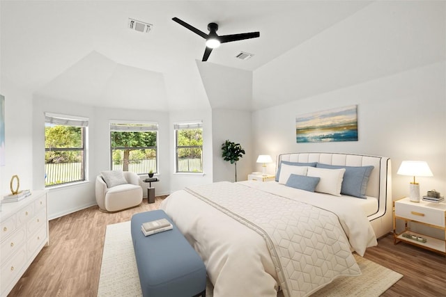270 Harris Dr, Austin, TX 78737 - bedroom featuring wood finished floors, vaulted ceiling, and a ceiling fan