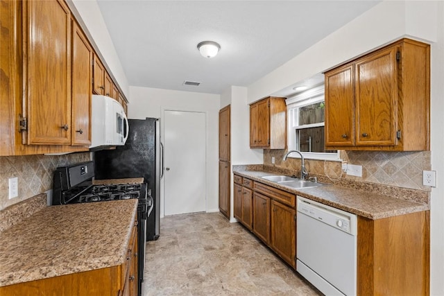 1404 Troy Ln, Round Rock, TX 78664 - kitchen featuring white appliances, a sink, and brown cabinets