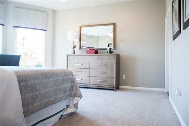 813 Vaughn St, Georgetown, TX 78628 - bedroom featuring light carpet and baseboards