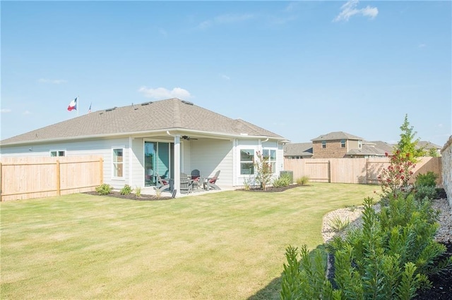 813 Vaughn St, Georgetown, TX 78628 - back of house with a ceiling fan and a patio area