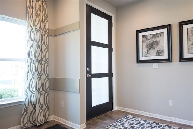 813 Vaughn St, Georgetown, TX 78628 - foyer with dark wood-type flooring and baseboards