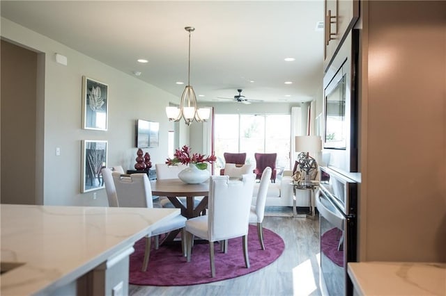 813 Vaughn St, Georgetown, TX 78628 - dining room featuring wood finished floors, recessed lighting, and a ceiling fan