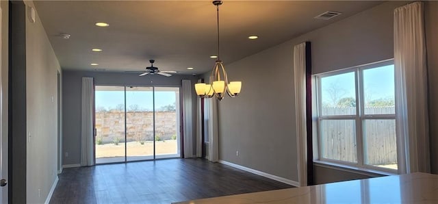 813 Vaughn St, Georgetown, TX 78628 - spare room with dark wood-style flooring, baseboards, recessed lighting, a chandelier, and a ceiling fan
