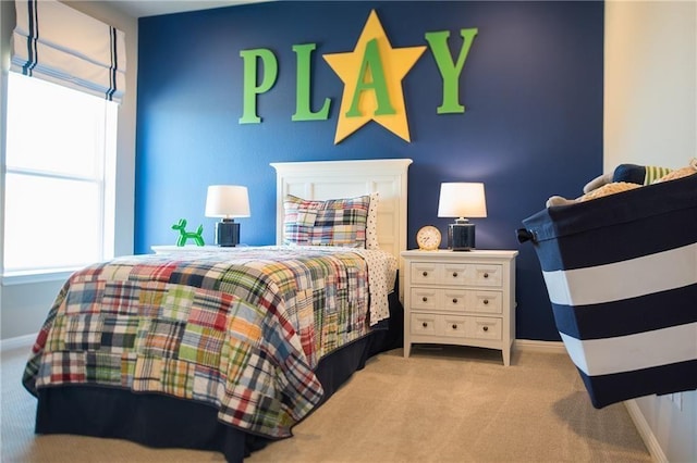 813 Vaughn St, Georgetown, TX 78628 - bedroom with baseboards and carpet flooring