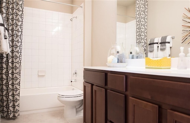 813 Vaughn St, Georgetown, TX 78628 - full bath with vanity, shower / bathtub combination with curtain, toilet, and tile patterned flooring