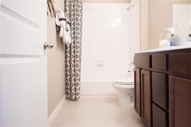 813 Vaughn St, Georgetown, TX 78628 - bathroom with tile patterned flooring, toilet, shower / tub combo with curtain, vanity, and baseboards