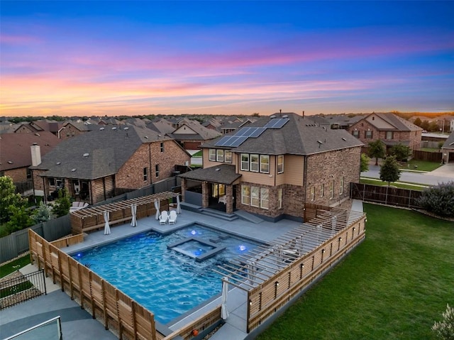 1312 Backcountry Dr, Leander, TX 78641 - view of pool featuring a residential view, a pergola, a pool with connected hot tub, and a patio area