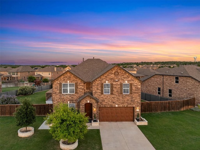 1312 Backcountry Dr, Leander, TX 78641 - traditional-style house with an attached garage, concrete driveway, a residential view, and a shingled roof