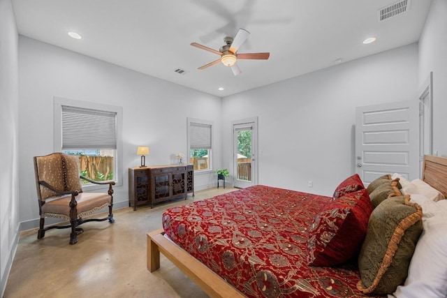 1402 E 11th St, Austin, TX 78702 - bedroom with multiple windows, access to outside, finished concrete flooring, recessed lighting, and a ceiling fan