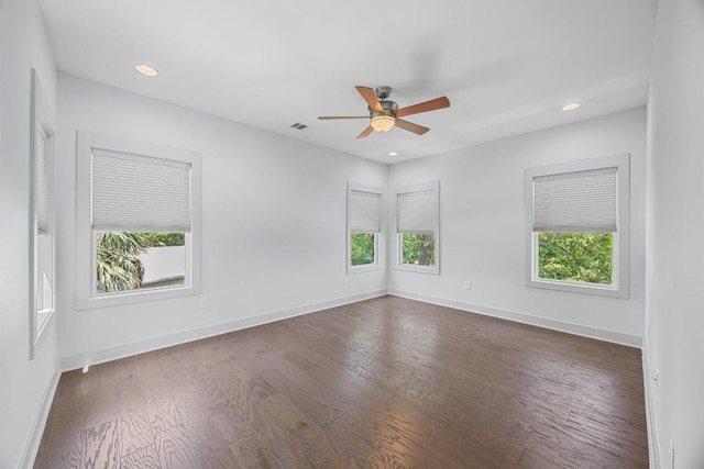 1402 E 11th St, Austin, TX 78702 - unfurnished room with healthy amount of natural light, a ceiling fan, wood finished floors, baseboards, and recessed lighting