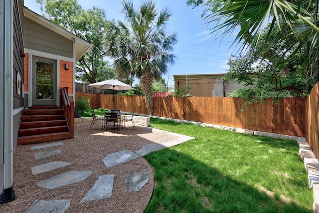 1402 E 11th St, Austin, TX 78702 - view of yard with entry steps and a patio