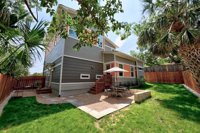 1402 E 11th St, Austin, TX 78702 - rear view of property with a patio
