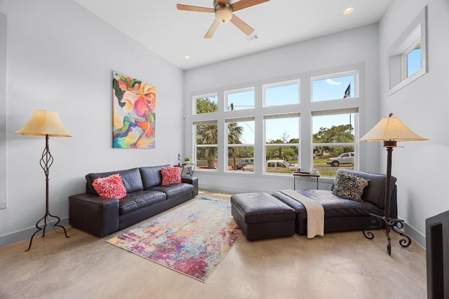 1402 E 11th St, Austin, TX 78702 - carpeted living room featuring baseboards, a ceiling fan, and recessed lighting