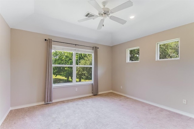 unfurnished room with light carpet, healthy amount of natural light, baseboards, and recessed lighting