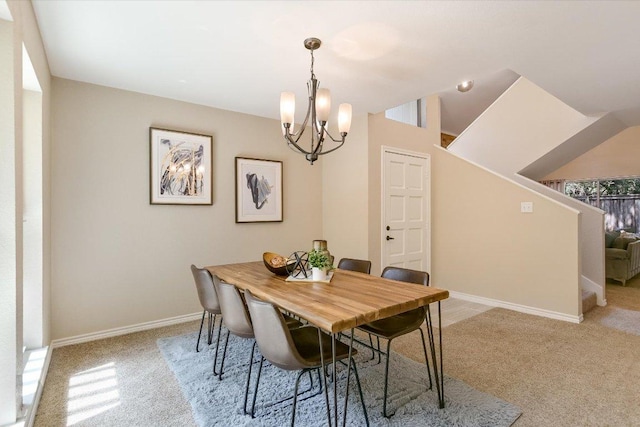 4117 Ridgeline Dr, Austin, TX 78731 - dining room featuring carpet, a chandelier, baseboards, and stairs