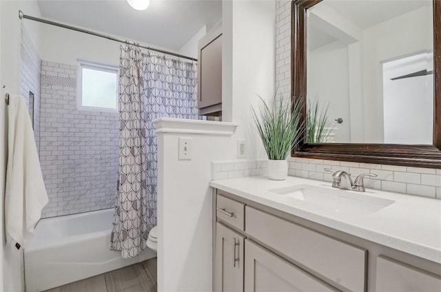 2603 Carlow Dr, Austin, TX 78745 - bathroom with vanity, shower / bath combo, and toilet