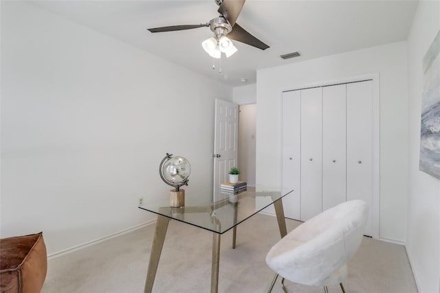 2603 Carlow Dr, Austin, TX 78745 - home office featuring light colored carpet, baseboards, and ceiling fan