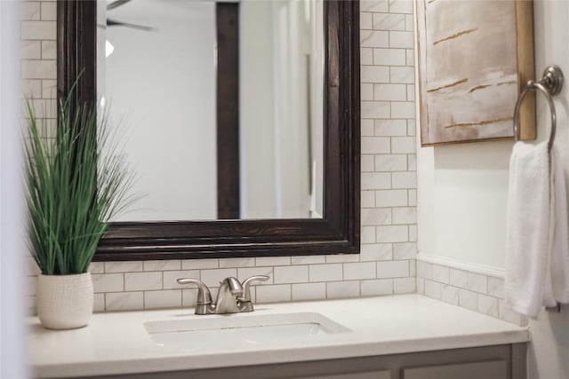 2603 Carlow Dr, Austin, TX 78745 - bathroom with vanity and tasteful backsplash
