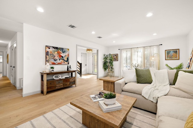 11008 Arch Ter, Austin, TX 78750 - living area with light wood-style floors and recessed lighting