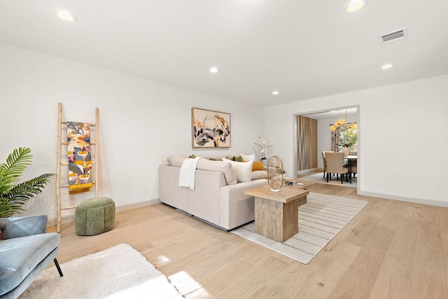 11008 Arch Ter, Austin, TX 78750 - living area featuring light wood-style flooring, recessed lighting, and baseboards