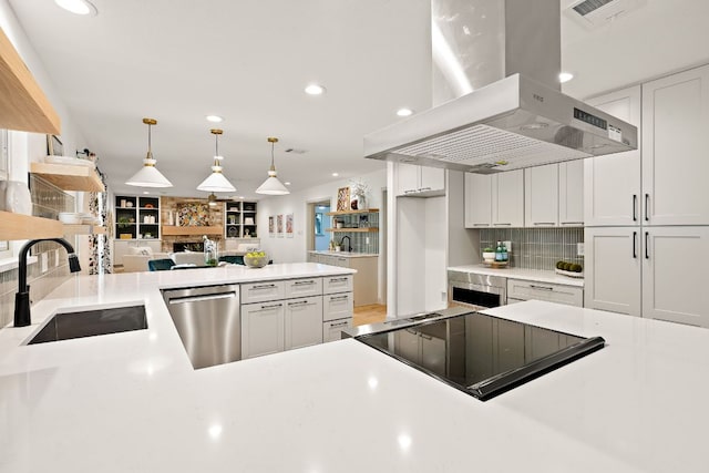 11008 Arch Ter, Austin, TX 78750 - kitchen with range hood, stainless steel dishwasher, stovetop, a sink, and recessed lighting