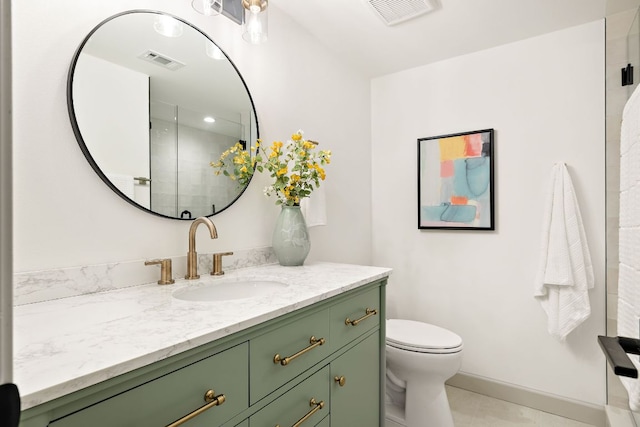 11008 Arch Ter, Austin, TX 78750 - bathroom featuring vanity, toilet, a shower with shower door, and tile patterned flooring