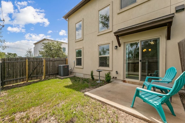 1701 S Bell Blvd Unit 101, Cedar Park, TX 78613 - rear view of house featuring central AC unit, a patio area, and stucco siding