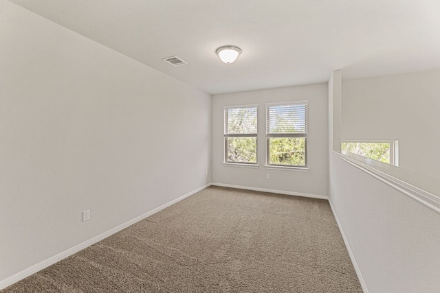 1701 S Bell Blvd Unit 101, Cedar Park, TX 78613 - spare room featuring carpet and baseboards